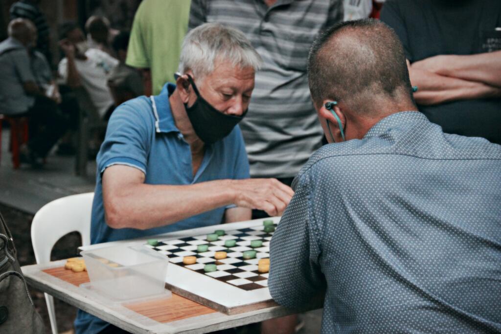Chinese men playing Chinese chess