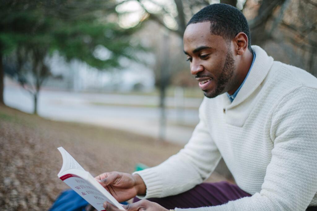 Learn with smiles. This image shows a students learning to excell academically.