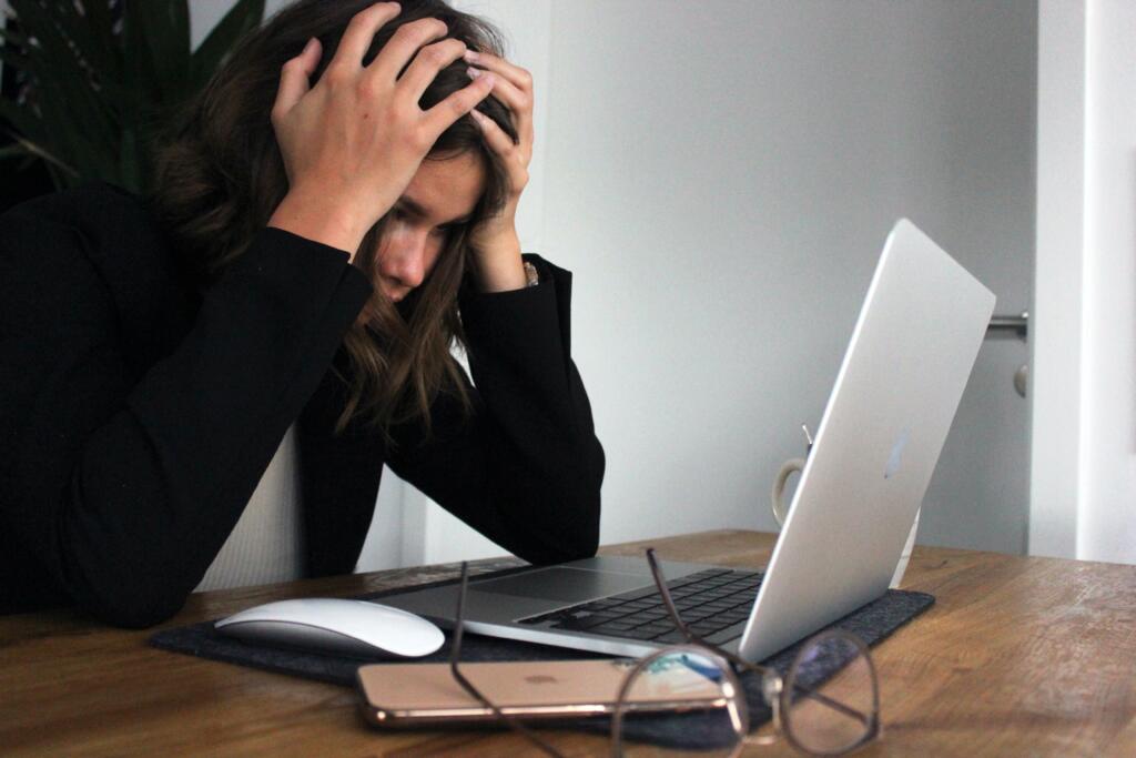 The image shows a students studying aggressively at the last minute hour to avert exam anxiety