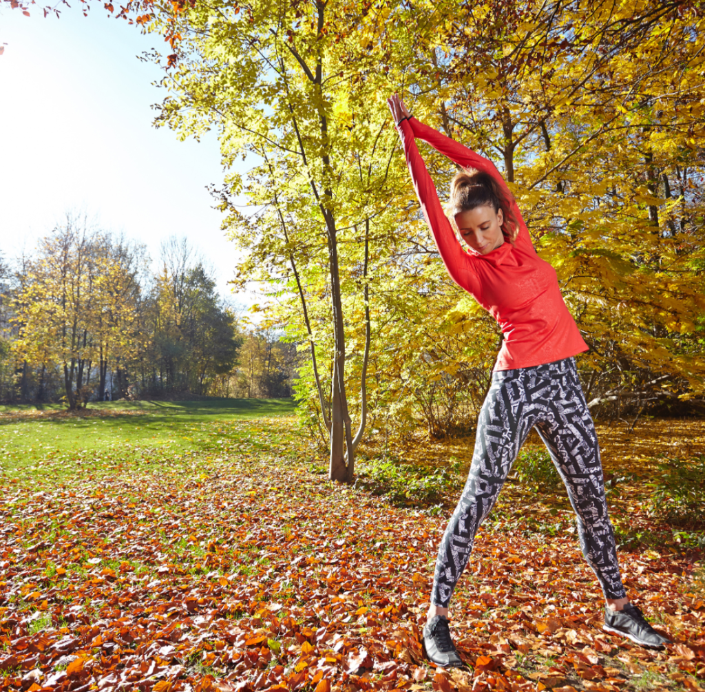 The picture shows a young lady exercising